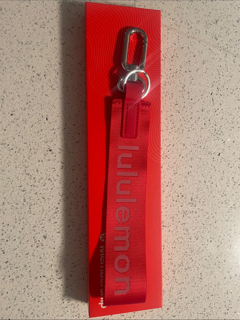 lululemon red membership key strap with silver hardware